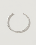 A silver-toned open hoop earring with a textured, hammered finish, displayed on a light gray background.